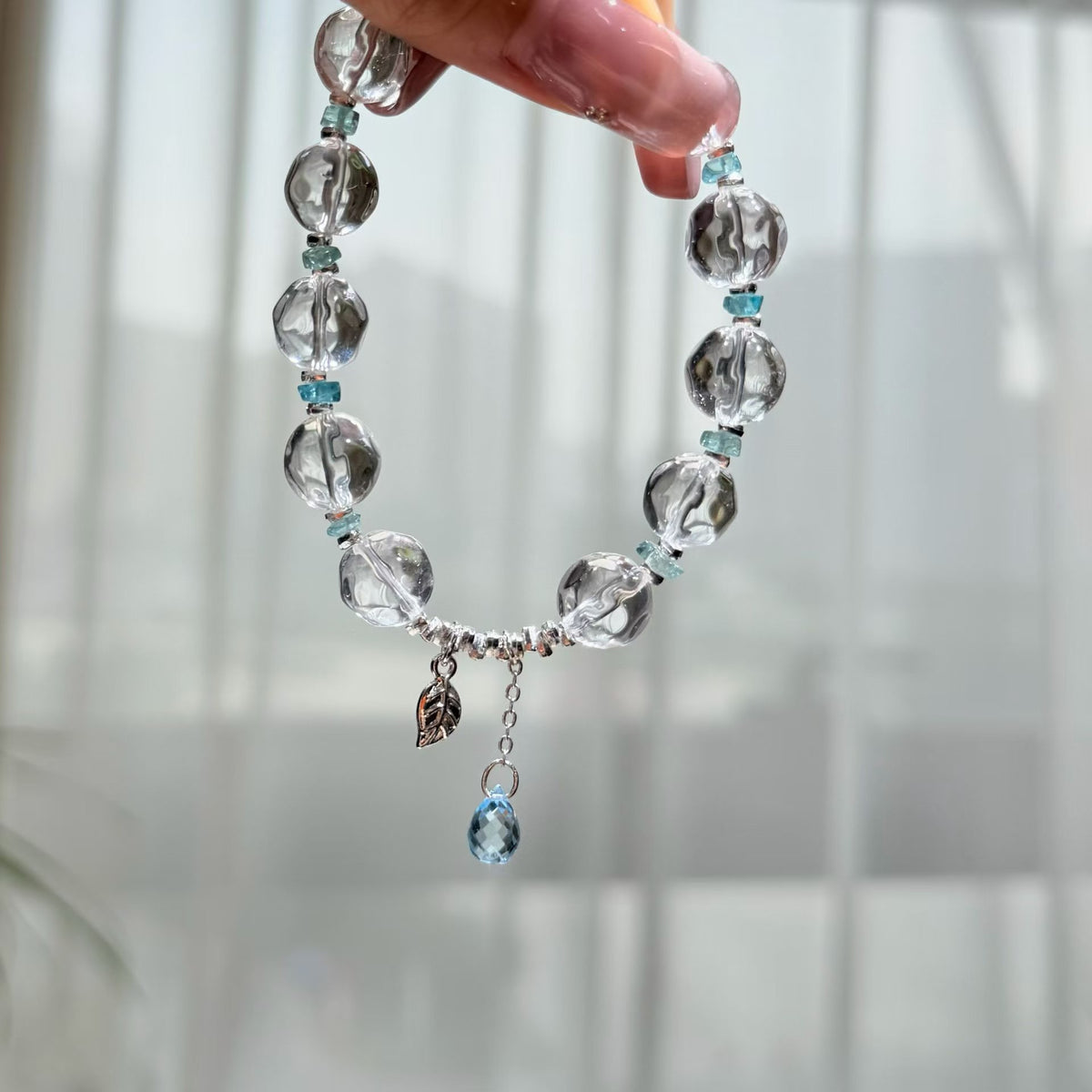 Sparkling Faceted Clear Quartz Bracelet with Sky Blue Charm