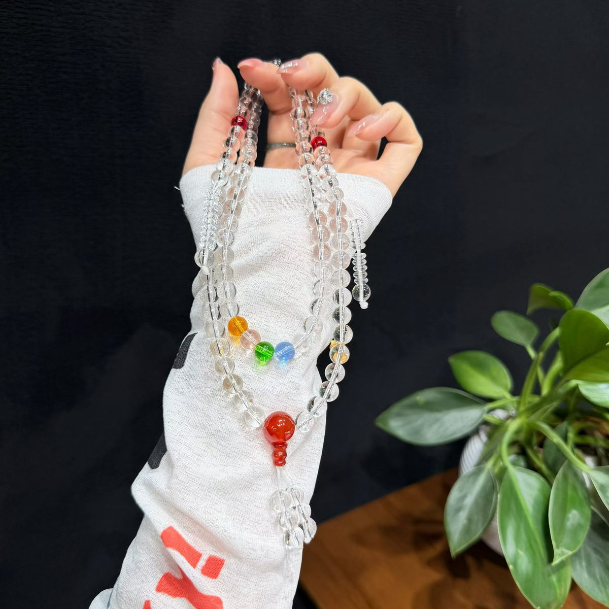 clear quartz crystal vibrant multi-colored gemstones and warm red agate