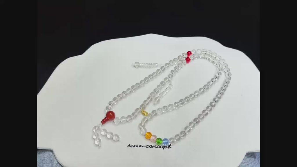 clear quartz crystal vibrant multi-colored gemstones and warm red agate